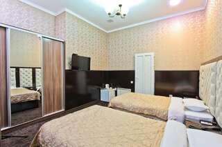Отель Grand Hotel Бишкек Стандартный двухместный номер с 1 кроватью или 2 отдельными кроватями-1